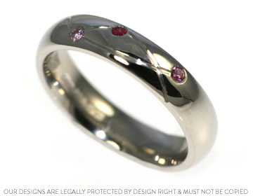 Lena's beautiful ruby and sapphire eternity ring