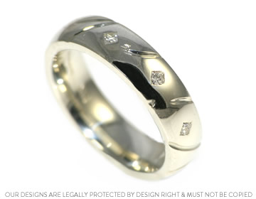 Clare's unique engraved wedding ring with sparkly diamonds