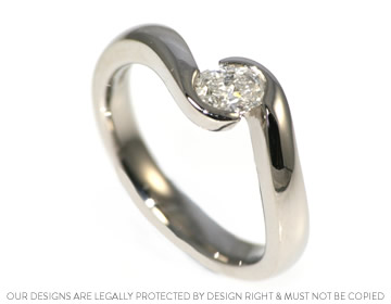 Ester's elegant asymmetric diamond engagement ring