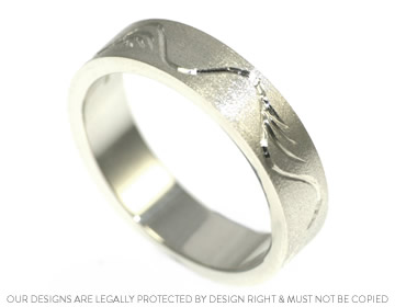 Luke's bespoke wedding ring with an engraved pattern