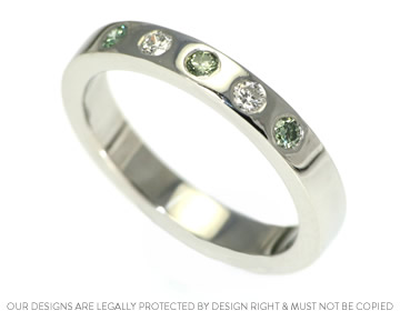 Gillian's handmade green diamond and platinum wedding ring