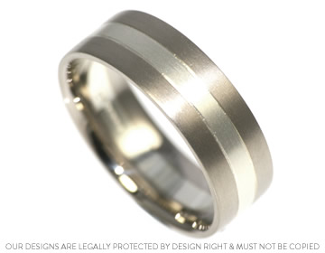 Mixed carat white gold wedding ring with saw cut lines