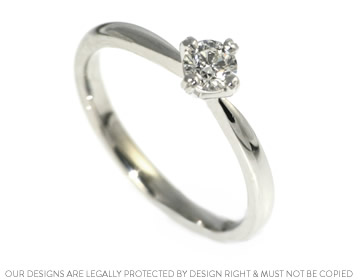 Simple and classically styled diamond engagement ring