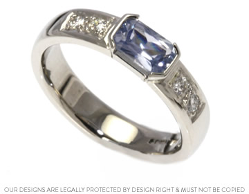 Emilie's stunning scissor cut blue sapphire engagement ring