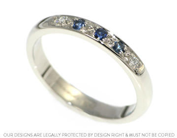 Delicate sapphire and diamond platinum eternity ring