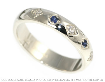 Striking diamond and sapphire eternity ring