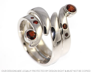 Emily's Sterling silver ring with three brilliant cut garnets