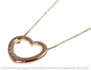 Handmade heart pendant in rose gold with beautiful diamonds