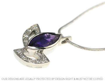 Clare's complimenting amethyst and diamond pendant set