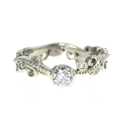 vine inspired engagement ring with a stunning diamond