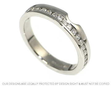 Beautiful platinum eternity ring with 20 channel set diamonds