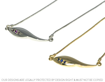 Complimenting white and yellow gold leaf inspired necklaces