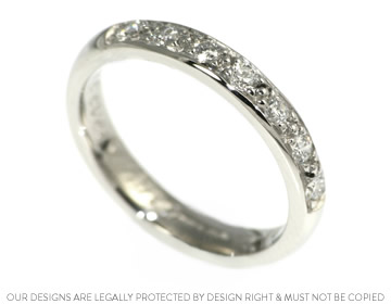 Platinum eternity ring with seven brilliant cut HSi diamonds 