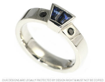 White gold ring with blue sapphires and black diamonds 