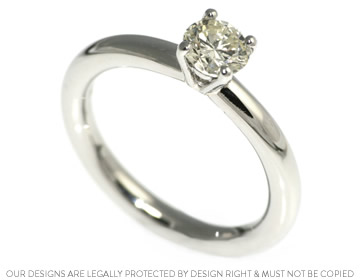 Karen's platinum engagement ring with a beautiful diamond