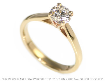 Gold engagement ring with 0.76ct brilliant cut diamond