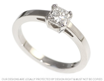 Mary's platinum engagement ring with a radiant cut diamond