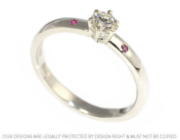 Delicate diamond and pink sapphire engagement ring