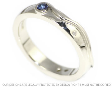 Hannah's beautiful comet inspired sapphire engagement ring