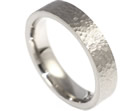 a bespoke palladium wedding band with a hammered effect