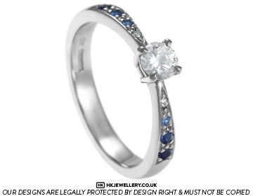 Palladium 0.30ct H S1 diamond engagement ring with graduating sapphires