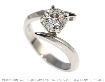 Alan's twist style platinum and 1.38ct diamond engagement ring