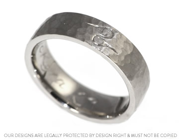 Rocky's surprise unique platinum engraved ring