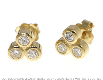 18ct Yellow gold earrings with six diamonds