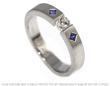 Carol's tension style diamond and sapphire dress ring.