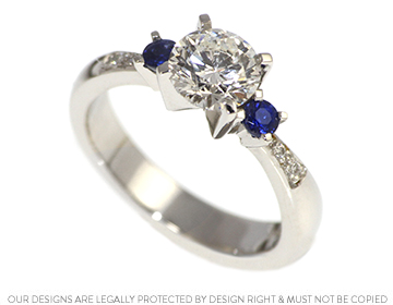 Jem's diamond and sapphire platinum engagement ring