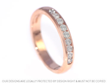 A beautiful 9ct rose gold and diamond wedding band