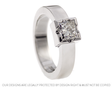 Vivien's striking princess cut diamond and palladium engagement ring.