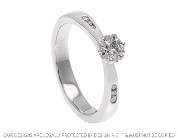 A striking lotus inspired palladium engagement ring.