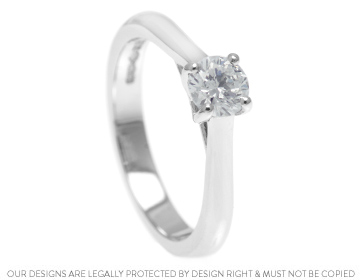 Vikki's classically styled diamond engagement ring