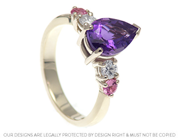 Gill's Fairtrade dress ring with pinks and purples