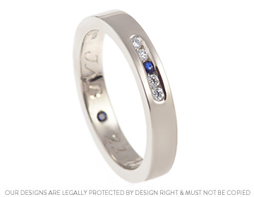 Emily's bespoke platinum diamond and sapphire eternity ring