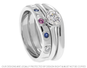 Nicola's platinum, diamond and sapphire eternity ring