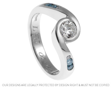 Gemma's twist style diamond engagement ring with white and blue diamonds