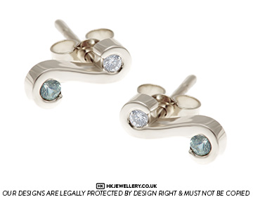 Nadia's green sapphire and diamond white gold earrings