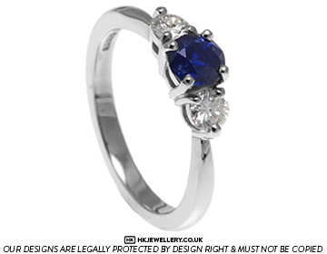 Fiona's stunning sapphire and diamond trilogy engagement ring