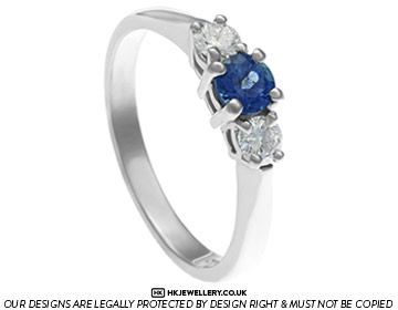 Clementine's classic sapphire and diamond trilogy engagement ring