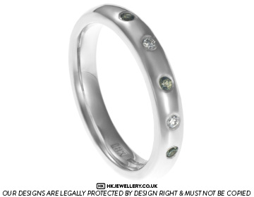 Leanne's white gold peridot and diamond wedding ring