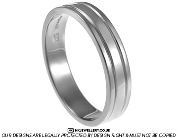 A bespoke platinum wedding band with engraved lines