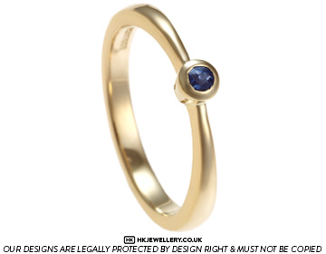 Lynda's blue sapphire and yellow gold dress ring