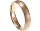 bryan's rose gold wedding ring with a hidden blue sapphire