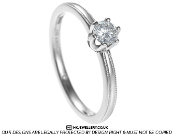 0.23ct F VS diamond and 9ct white gold solitaire with a secret