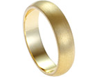 oliver's bespoke yellow gold wedding ring with a satinised finish