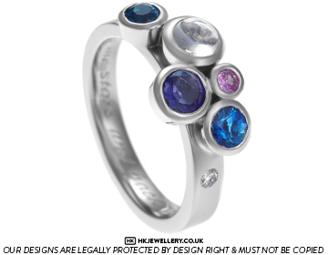 Helen's bespoke eclipse inspired palladium multi-stone dress ring