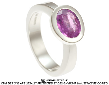 Emily's oval cut pink sapphire dress ring