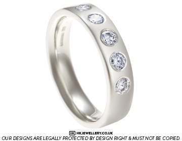 Marie's striking diamond and 9ct white gold wedding and eternity ring.